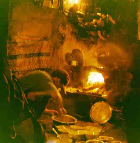 cooking on open fire in a kitchen, Nepal